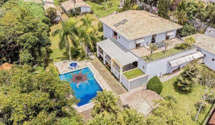 Casa com 5 suítes e casa de hospede s à venda, 750 m² por R$ 2.499.000 - Fazendinha - Carapicuíba/SP