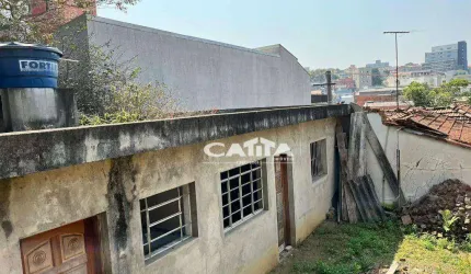 Terreno com casa antiga