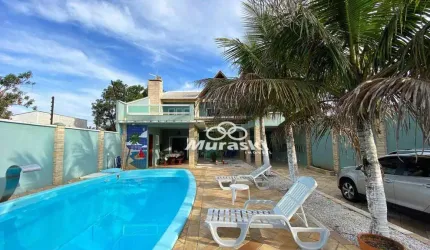 Casa com 4 dormitórios à venda, 230 m² por R$ 780.000,00 - Coroados - Guaratuba/PR