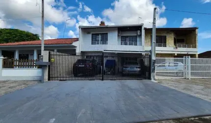 Sobrado com 3 dormitórios à venda, 124 m² por R$ 600.000,00 - Brejatuba - Guaratuba/PR