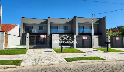 Sobrado com 3 dormitórios à venda, 124 m² por R$ 869.000,00 - Centro - Guaratuba/PR