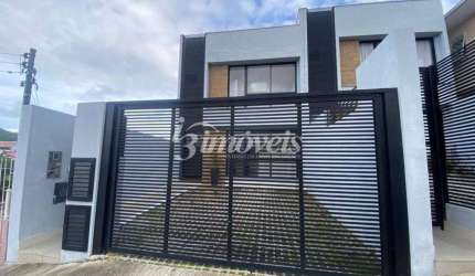 Sobrado à venda, alto padrão acabamento, 3 quartos sendo 1 suíte, 2 vagas, Bairro Fazenda, Itajaí-SC
