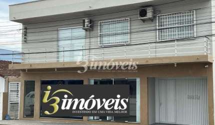 Imóvel comercial e residencial à venda, 7 salas, 3 quartos, sendo 1 suíte, bairro Centro, Navegantes SC