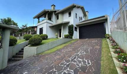 Casa com 3 quartos à venda na Oswaldo Aranha - E, 110, Maria Goretti, Chapecó por R$ 2.450.000