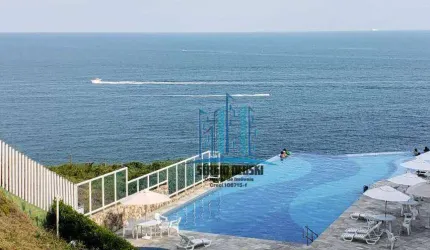 Vista mar incrível, varanda, 2 suítes. Piscina com borda infinita. Guarujá-SP.