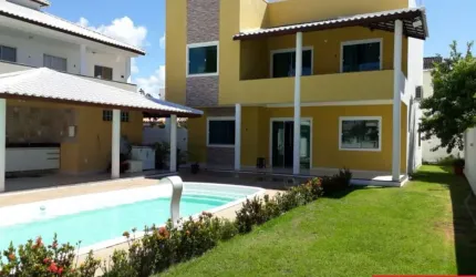 Casa em condomínio fechado com 5 quartos à venda na Condomínio Villas do Jacuípe, 1, Barra do Jacuípe, Camaçari por R$ 1.100.000