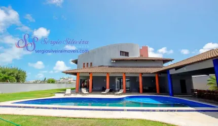 Luxuosa casa no Bairro Dunas com 5 suítes e vista para o mar.