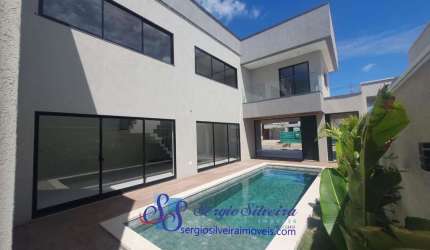 Belíssima casa com 4 suítes e piscina privativa no Terras 1.