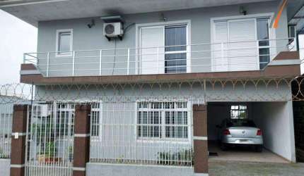 Casa com 4 dormitórios à venda, 220 m² por R$ 1.150.000,00 - Barreiros - São José/SC