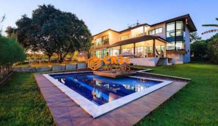 Casa em Condomínio com 580m² com 4 Suítes, mais Acomodação p/Hospedes, p/Venda o