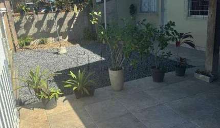 Geminado térreo em condomínio fechado Jardim das Flores no bairro Estrada Nova