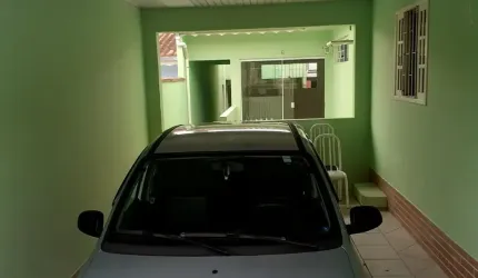 Vendo lote em Araucária com  03 casas construídas.