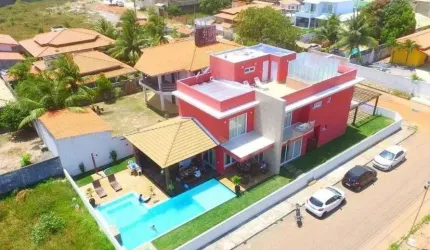 Casa com 4 dormitórios à venda, 500 m² por R$ 1.500.000,00 - Barra do Jacuípe - Camaçari/BA
