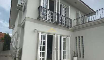 CASA À VENDA COM 4 DORMITÓRIOS NO BAIRRO CINQUENTENÁRIO