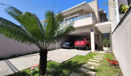 Casa com quintal, edícula e 3 dormitórios à venda, 224 m² por R$ 1.590.000 - Uberaba - Curitiba/PR