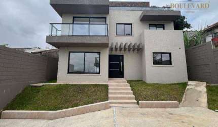 Sobrado novo em condomínio fechado com 3 dormitórios à venda, 165 m² por R$ 1.290.000 - Uberaba - Curitiba/PR