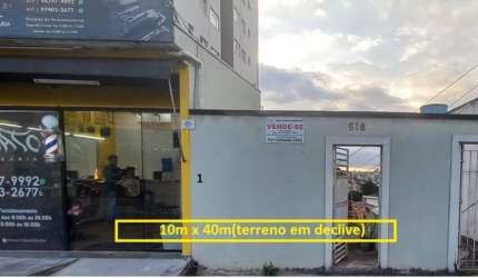 Ótimo terreno com 2 casa e 1 loja alugados - 10x40