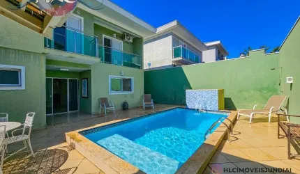 Venda - Maravilhosa Casa a Venda em Condomínio Village das Flores - 3 Suítes 4 Vagas de Garagem, Piscina