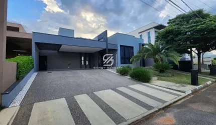 Casa térrea com 4 suítes e ampla área de lazer no condomínio Fazenda Imperial.