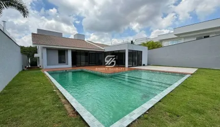 Casa  com 5 suítes e ampla área de lazer no condomínio Fazenda Imperial.