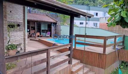 Casa com 4 quartos à venda na Rua Urucum, 4, Potecas, São José por R$ 900.000