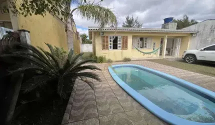 Casa com piscina em Nova Tramandaí