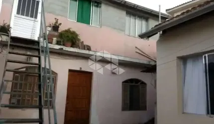 Terreno com 3 casas na Parada Inglesa
