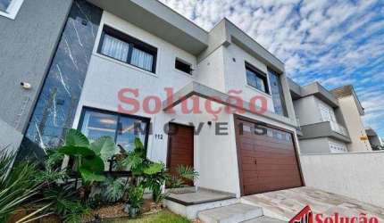 Casa com 3 quartos à venda no Mont Serrat, Canoas  por R$ 1.350.000