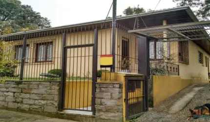 Casa com 4 quartos à venda na Honduras, 31, Jardim América, Caxias do Sul por R$ 689.000