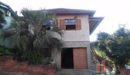 Casa com 4 quartos à venda na Affonso Arinos, 127, Rio Branco, Caxias do Sul por R$ 450.000