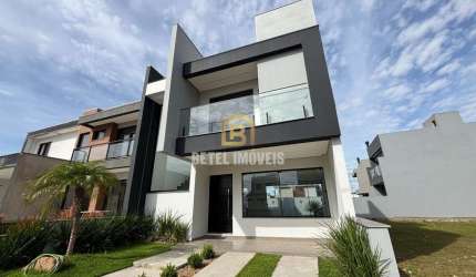 Casa em condomínio fechado com 3 quartos à venda na Avenida Centenário, 1011, Passo das Pedras, Gravataí por R$ 898.000