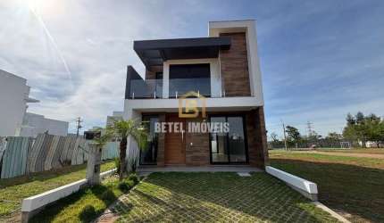 Casa em condomínio fechado com 3 quartos à venda na Avenida Centenário, 1011, Passo das Pedras, Gravataí por R$ 890.000