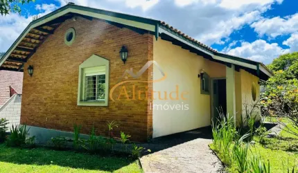 Casa térrea envolta pela natureza numa localização excepcional