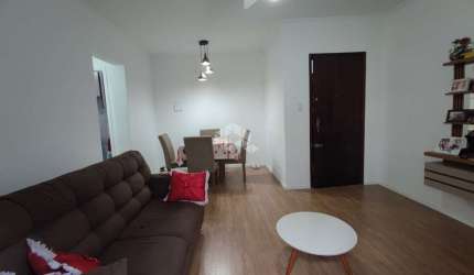 Apartamento a venda na praia grande no bairro guilhermina com 1 quarto e 1 vaga