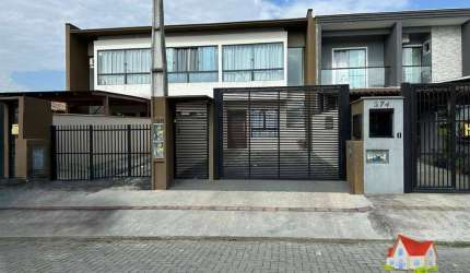 Sobrado Geminado C/115 m2 C/03 Quartos C/Suite + Area C/Churrasq. + 02 Vagas de Garagem No Jardim Iririu!