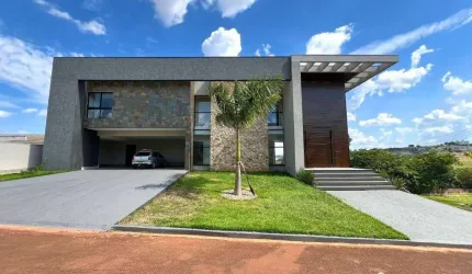 Casa com 4 dormitórios à venda, 553 m² por R$ 3.890.000,00 - Condomínio Costa do Sol - Rolândia/PR
