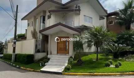 Casa 240m² (430m² terr.), 3 suítes, 2 salas, varanda gourmet, piscina.