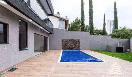 Casa a venda no Campo Comprido, 3 suítes, 4 vagas de garagem, com piscina aquecida e espaço gourmet com churrasqueira