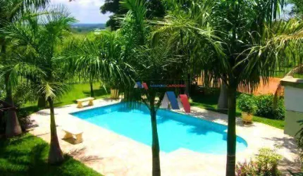 Chácara com 3 dormitórios à venda, 4000 m² por R$ 550.000,00 - Estância São Carlos - Guapiaçu/SP