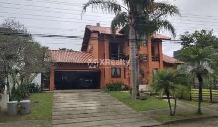 Casa em condomínio fechado com 4 quartos à venda na Rodovia Doutor Antônio Luiz Moura Gonzaga, 647, Rio Tavares, Florianópolis por R$ 4.500.000