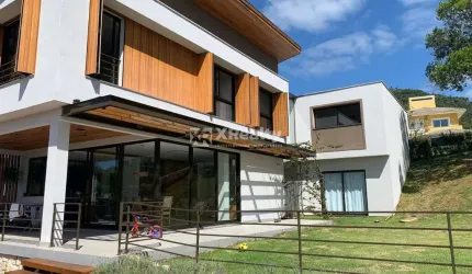 Casa em condomínio fechado com 4 quartos à venda na Rodovia Doutor Antônio Luiz Moura Gonzaga, 647, Rio Tavares, Florianópolis por R$ 6.990.000