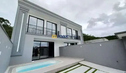 Casa com piscina à venda em Camboriú – 11min da praia