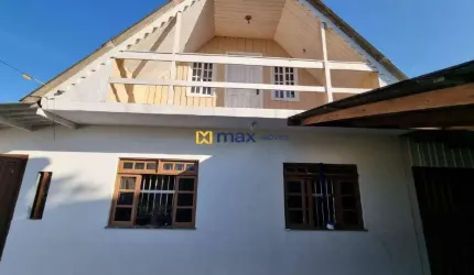 Venda: Terreno com 2 casas - Centro- Navegantes SC