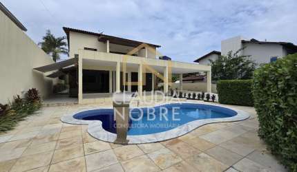 Uma casa moderna cercada pela natureza no condomínio San Nicolas em Maceió-AL