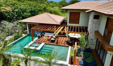 Casa Extraordinária no Condomínio Praia Bella em Praia do Forte. 6 suítes, 500m2 de área construída, a 700m da Praia! Finamente decorada e mobiliada!