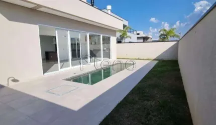 Casa à venda com 4 suítes no Loteamento Residencial Arborais, Campinas.