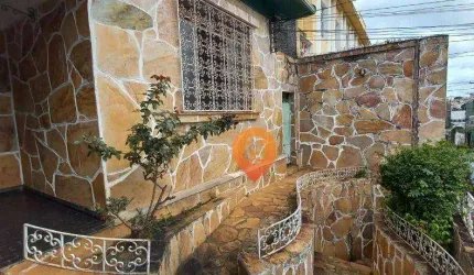 Casa de 3 quartos, quintal e edículas no bairro Santa Tereza