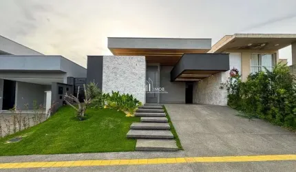 Casa térrea com 3 suítes sendo uma master com closet e banheira.