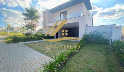 Casa no Condomínio Alpha Ville 4 - Área de lazer, 4 Suítes e muito mais!