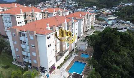 Apartamento à venda, no Bairro Centro, São José-SC, com 2 quartos, sendo 1 suíte, com 1 vaga